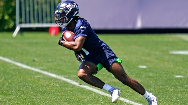 Seattle Seahawks wide receiver D'Wayne Eskridge runs a drill during an NFL football rookie minicamp Friday, May 14, 2021, at the team's training facility in Renton, Wash.
